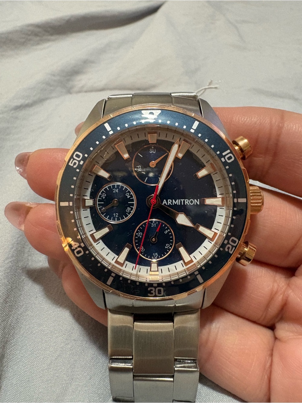 Armitron Two-Tone Blue Dial Chronograph Watch with Red Accents
